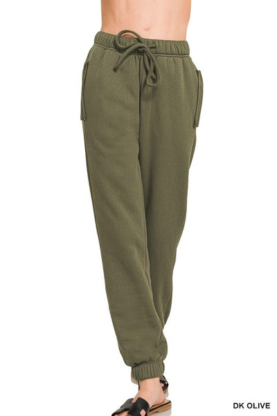 Jogger with exposed pocket