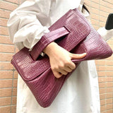 Crocodile Print Clutch With Wrist Strap