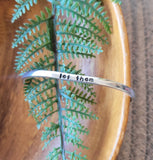 Let them cuff, Hand stamped aluminum