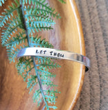 Let them cuff, Hand stamped aluminum