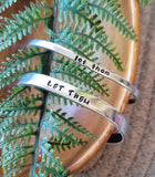 Let them cuff, Hand stamped aluminum