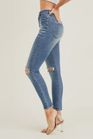 High rise distressed knee jeans
