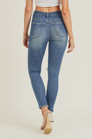 High rise distressed knee jeans