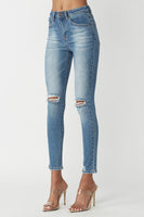 High rise distressed knee jeans
