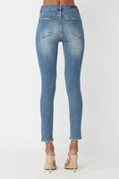 High rise distressed knee jeans